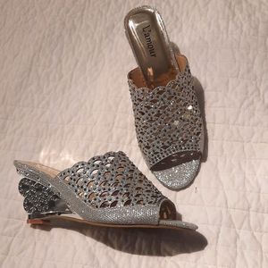 Glitzy shoes with silver colored see through heel